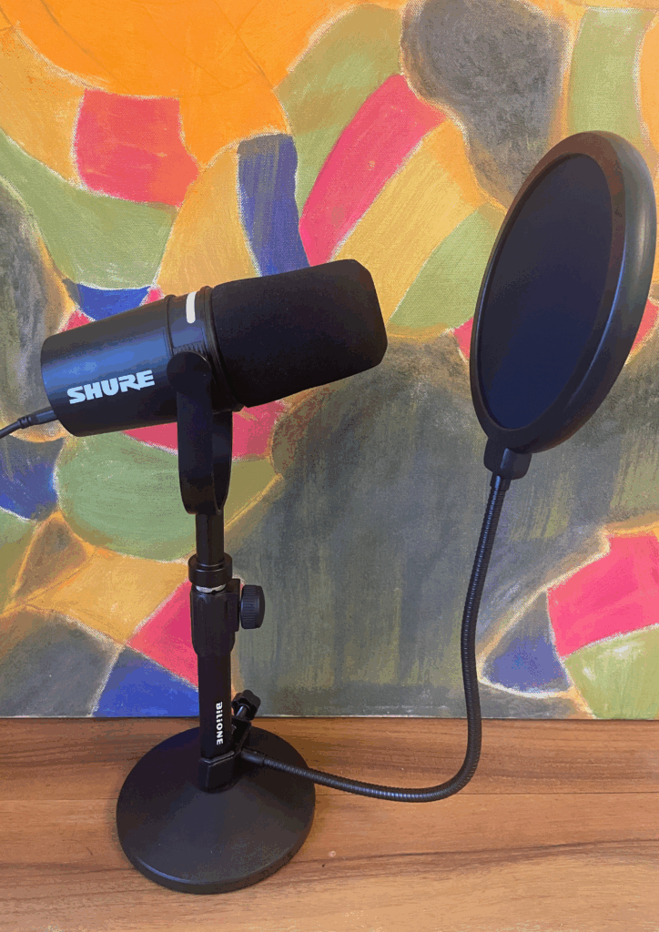Podcast Radio Spassmuskeltraining, Mikrofon Shure, bunter Hintergrund
